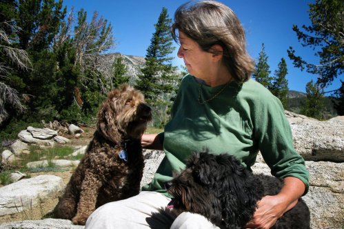 Judith Curry with her dogs, Rosie (left) and Bruno, in the mountains near Lake Tahoe. The climatologist focuses on the uncertainties of climate change far more than on the consensus of climate scientists.